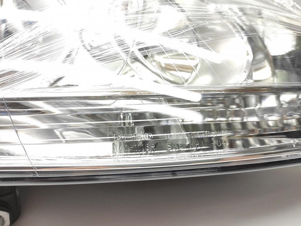 Farol Direito Vw Golf V 03-08 Cromada