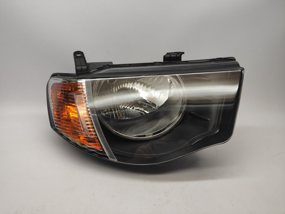Farol Direito Mitsubishi L200 06- Pisca Laranja