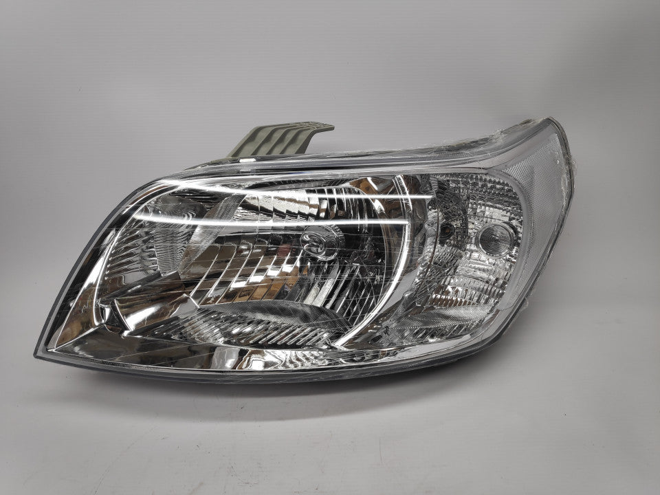 Farol Esquerdo Chevrolet Aveo 3 / 5P 09-11