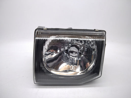 Farol Esquerdo Manual Mitsubishi Montero / Pajero 97-00