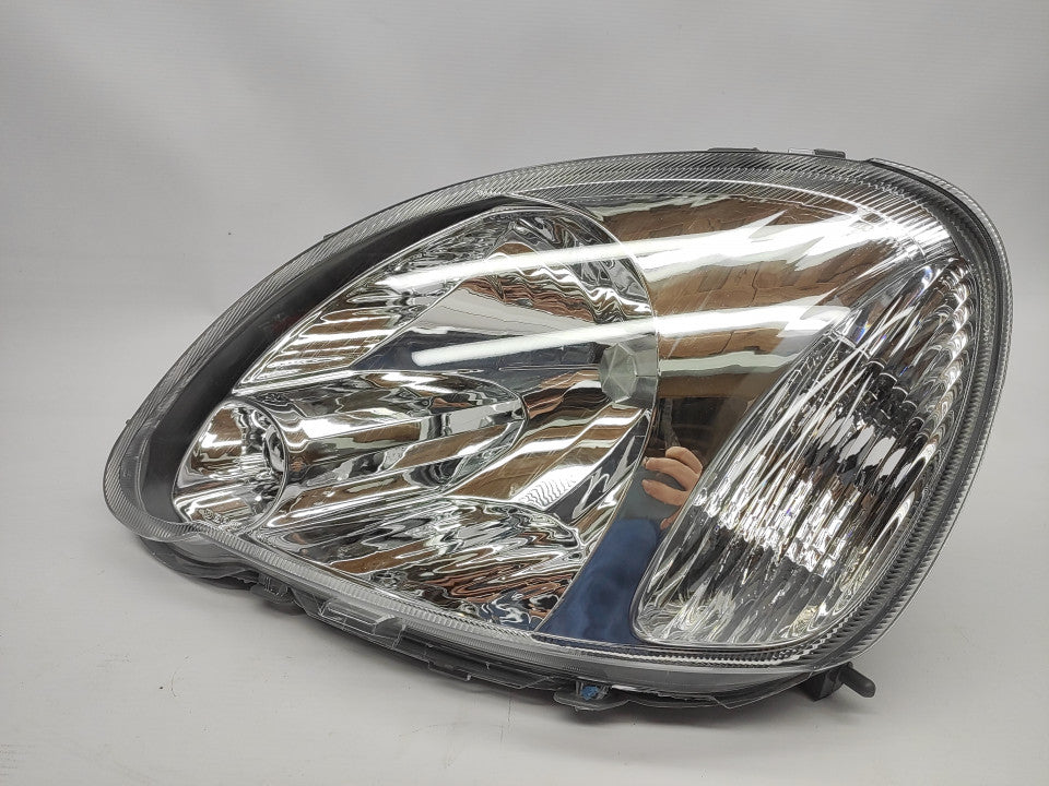 Farol Esquerdo Manual Toyota Yaris 03-05