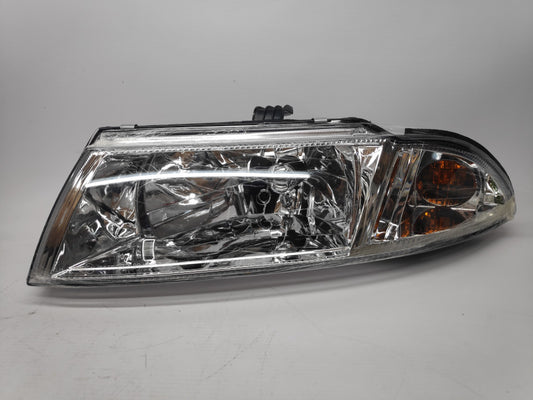 Farol Esquerdo Mitsubishi Carisma 99-05