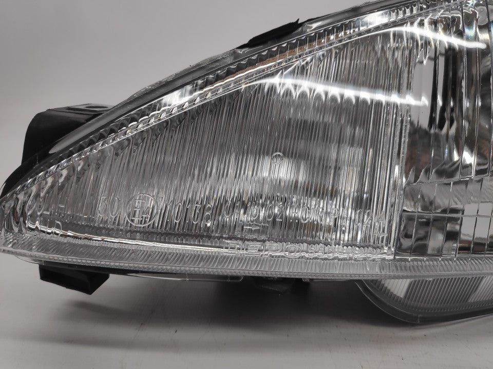Farol Esquerdo Peugeot 206 98-02