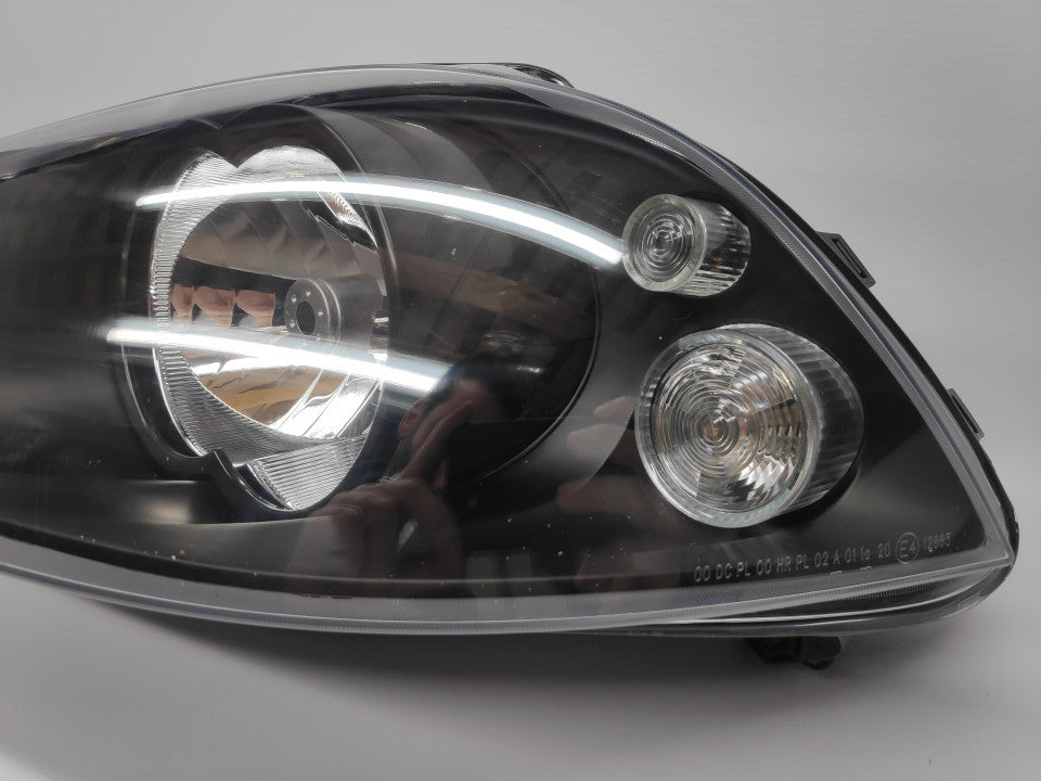 Farol Esquerdo Seat Ibiza 6L 02-10 H4