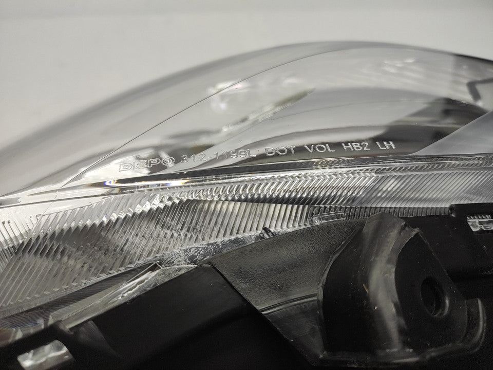 Farol Esquerdo Toyota Yaris 5P 06-09