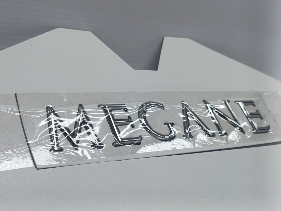 Letring Emblema Tampa Mala Renault "Megane" II 02-09